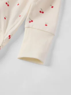 Förlängningsbar omlottbody körsbär