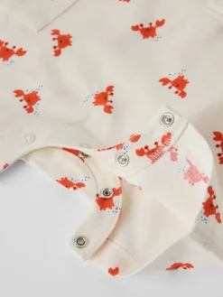 Kortärmad jumpsuit krabbor