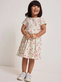 Kortärmad snurrklänning jordgubbar